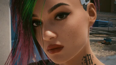 description_0 Face and eyebrow makeup.